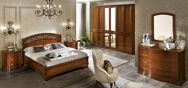Деревянная кровать с резной спинкой, тумбы, комод с зеркалом, шкаф и кресло TORRIANI