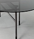 Итальянский обеденный стол из черного стекла на темных металлических ножках GLAMUOR