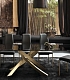 Стильный обеденный стол из черного стекла на золотистых ножках ARTISTICO