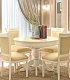 Круглый обеденный стол на четыре персоны и мягкие стулья в классическом стиле Torriani